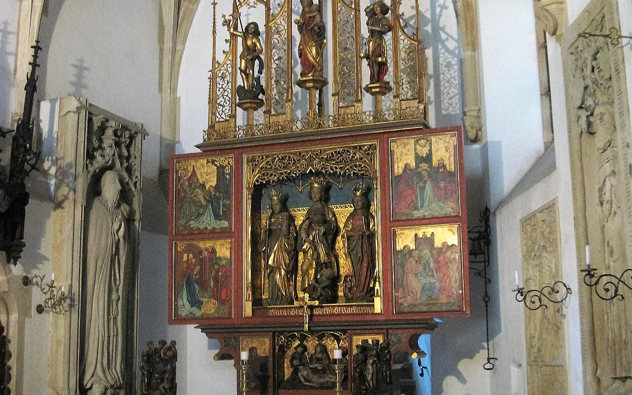 The neo-Gothic chapel inside Bouzov Castle, with its carved Gothic altar