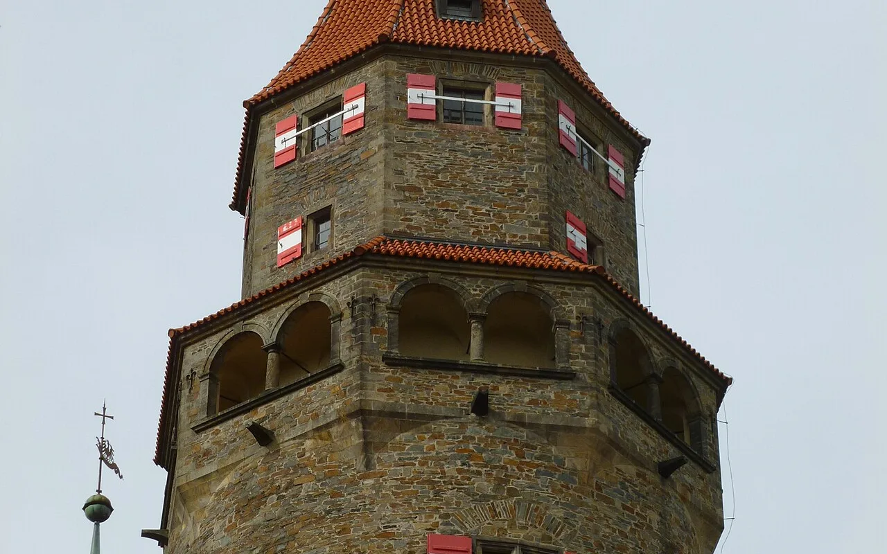Bouzov Castle's eight-storey, 58-metre tower rising above the Moravian treeline